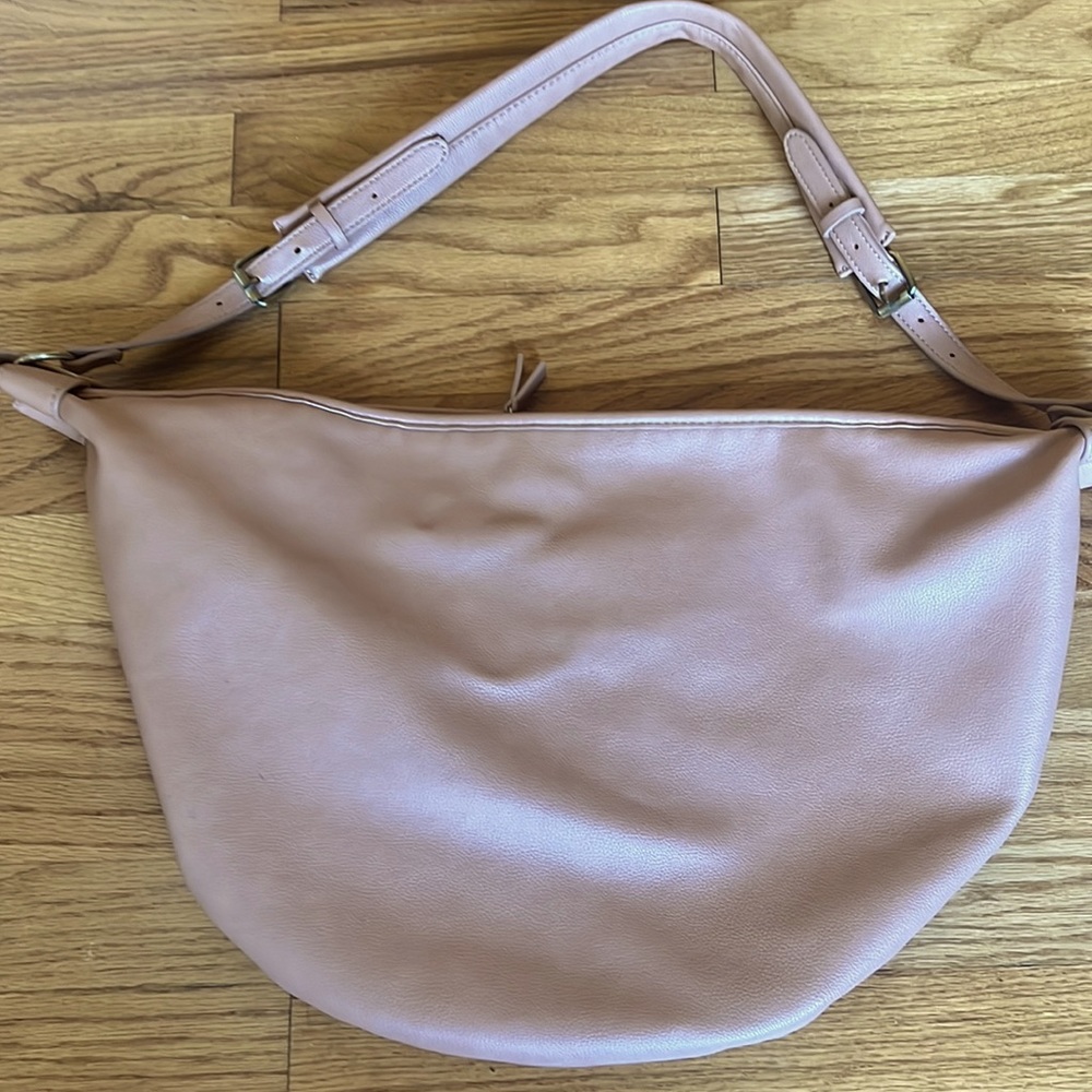 Sling bag, interior pen marks